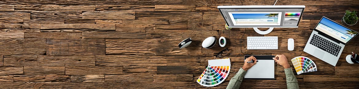 Designer Editing Photo On Computer